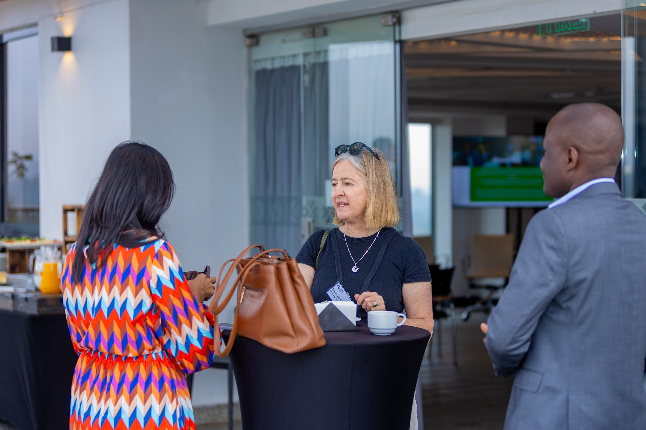 Business leaders exchanging ideas at a Chamber event