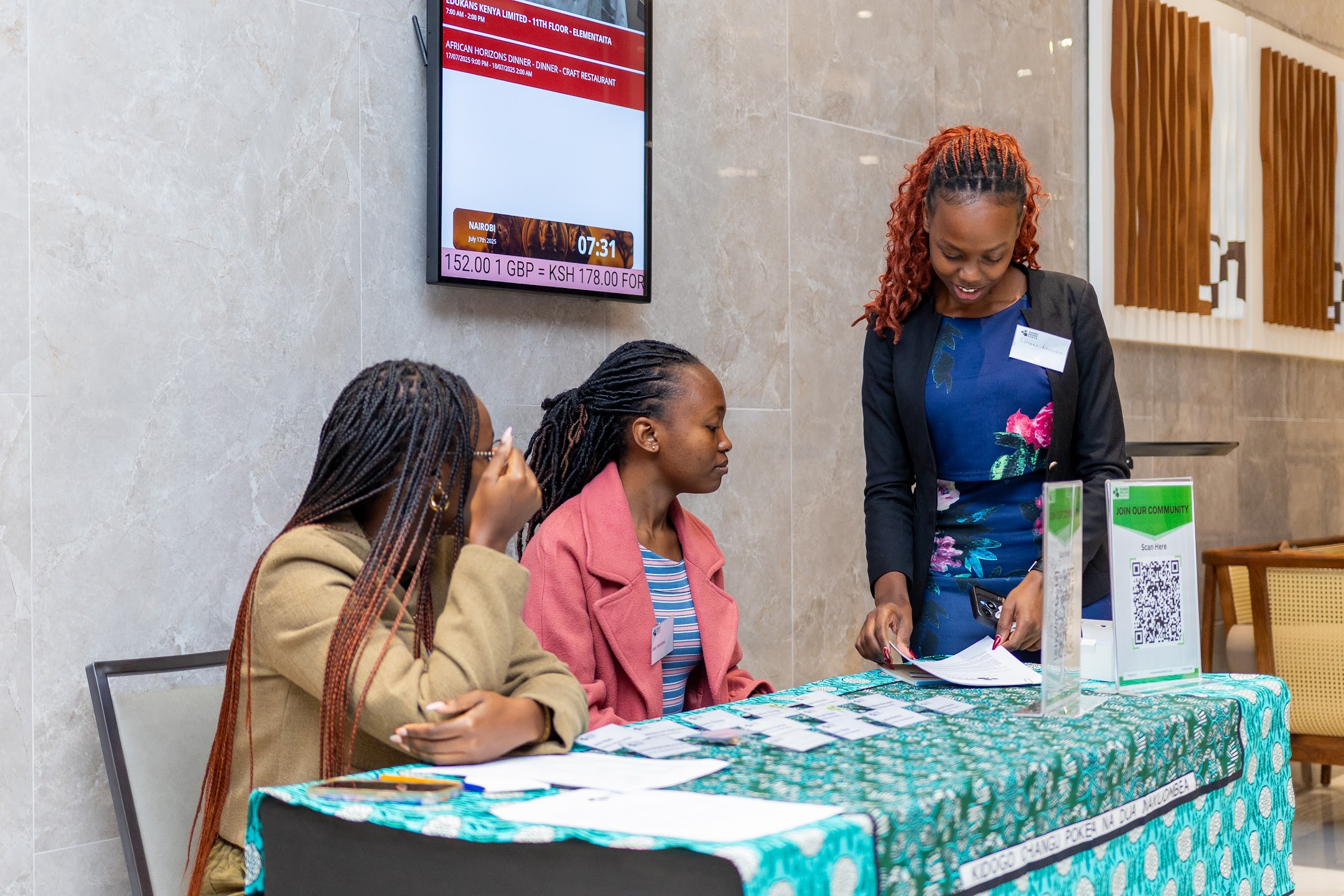 Guests at a Chamber event welcome table