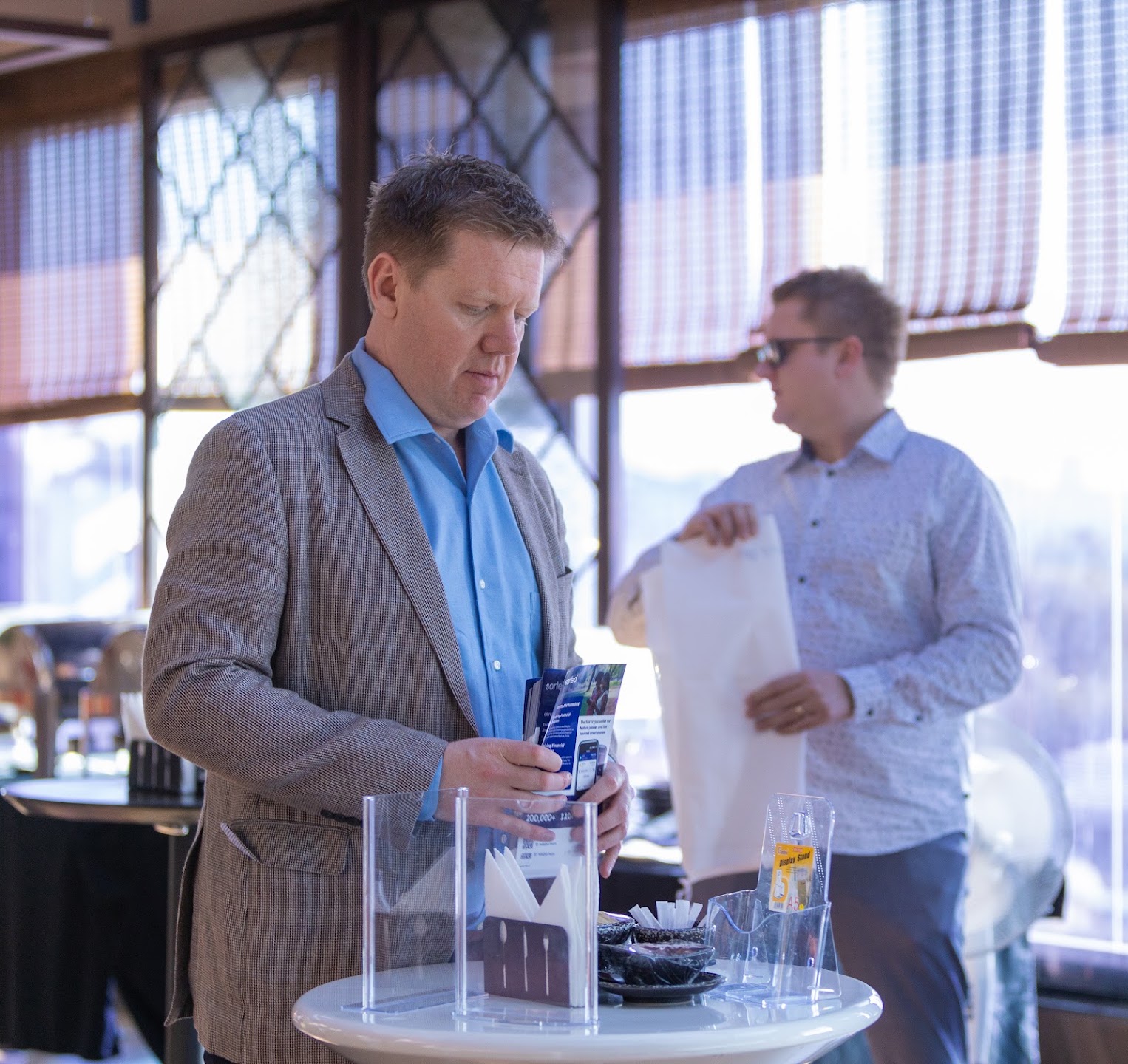 Two attendees talking at the SORTED mixer