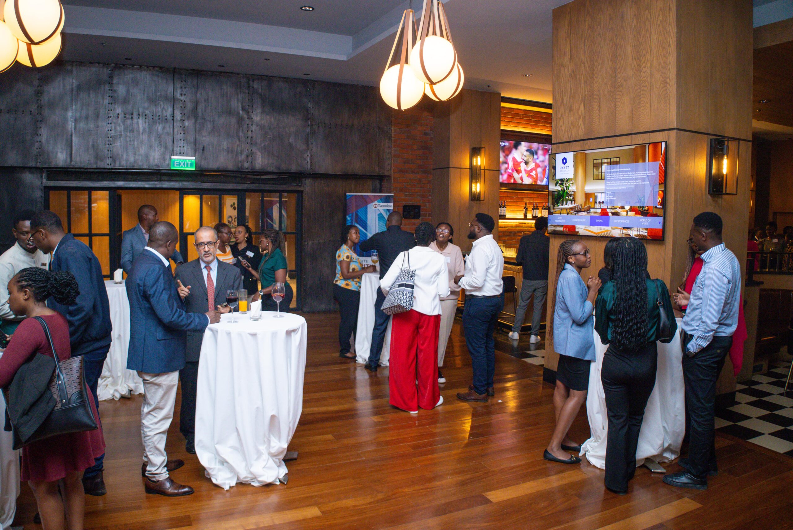 Guests networking and sharing conversations at a business reception