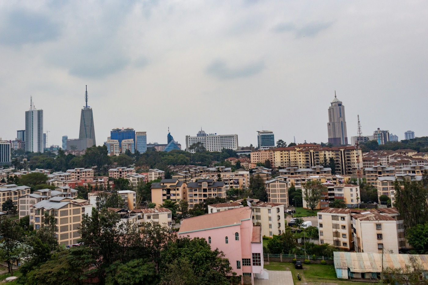 Nairobi skyline with modern office towers above tree-lined neighbourhoods